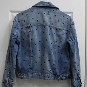 Jean jacket with heart pattern